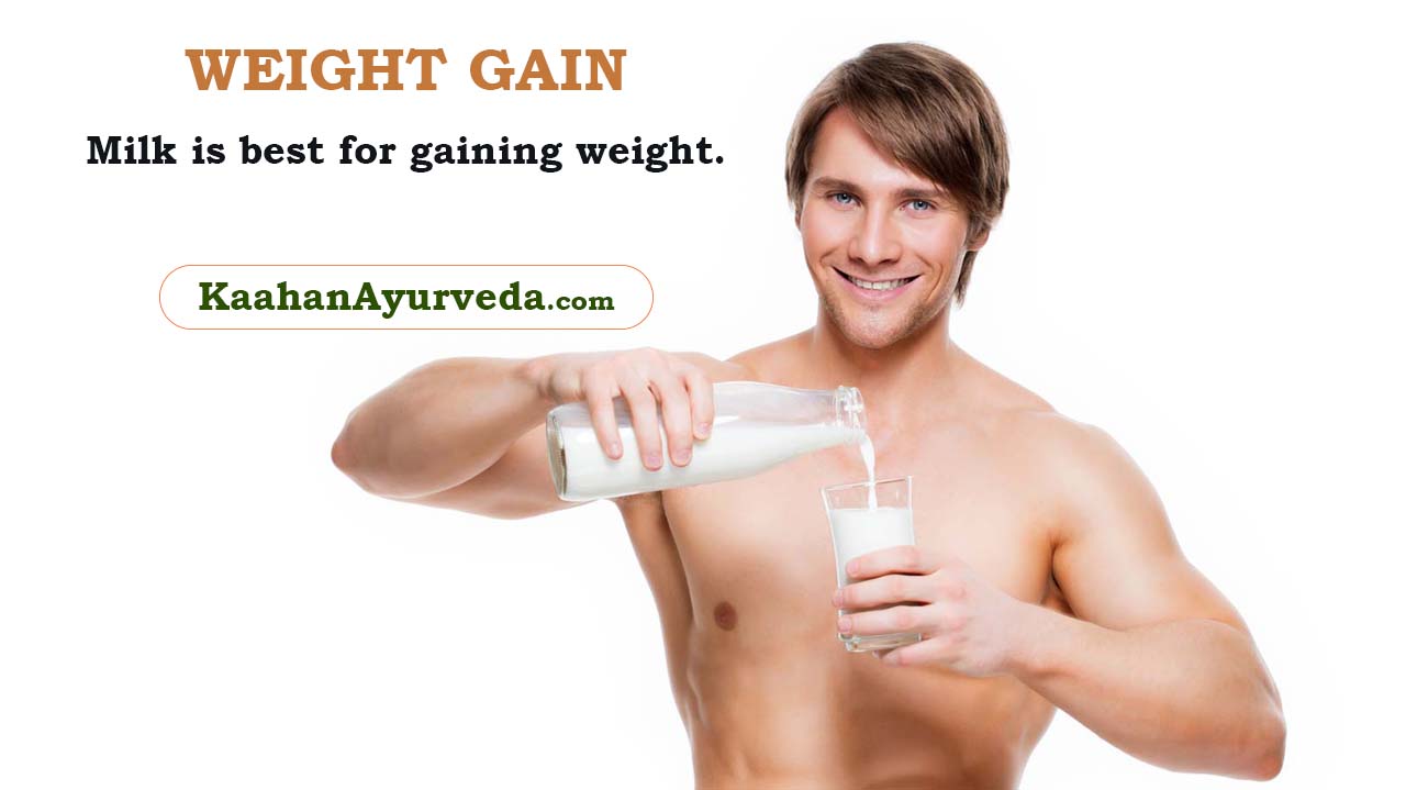 Muscular man pouring milk